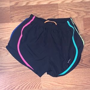 Black- colorful Nike shorts! Excellent condition, orange draw strings.